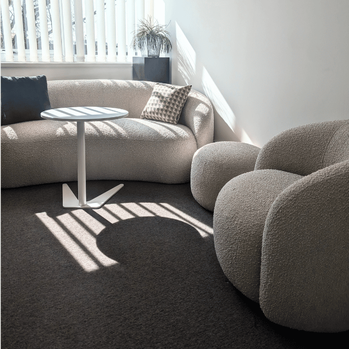 Poole dorset showroom with phoebe soft seating and laptop table ibn boucle cream fabric