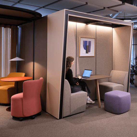 orangebox london showroom with four person booth and soft seating