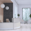 corner curved receptiv reception desk with ball pendant lights and lounge seating in waiting area