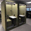 green penelope telephone booth with white table from jdd furniture uk manufacturer