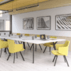 white sirius meeting table metal y leg in black with yellow feature meeting chairs and ceiling acoustic baffles