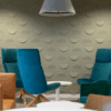 allsfar ora 3d acoustic wall panel in sage green with turquoise lounge seats in front