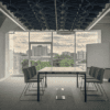 metting room with flott acoustic ceiling tiles above from allsfar in dark green colour scheme