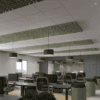 strips of the flott acoustic ceiling tiles from allsfar in a green pet in an open plan office