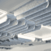 close uo of the flott acoustic ceiling tiles from allsfar in a light grey pet