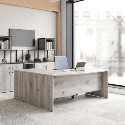 ntaural oak panel end odyssey executive desk with matrix storage unit behind