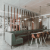 JDD Bruce Modular Seating with green upholstery, cafe interior inspiration, with wooden slatted feature wall