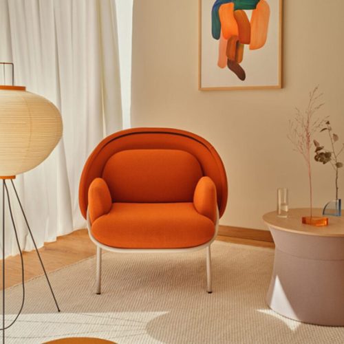Mesh Lounge Chair with orange finish and white metal legs