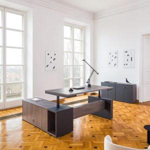 Mito Height Adjustable Desk in a bright office environment