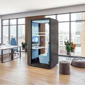 hush booth with blue interior fabric in an office