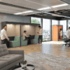 Era condo agile working office pod in pink and green fabric. Two person pod perfect solution for quiet areas, meeting spaces and collaborative office areas