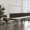 Lavoro firmo bench desk with desk mounted screens and black mesh chairs