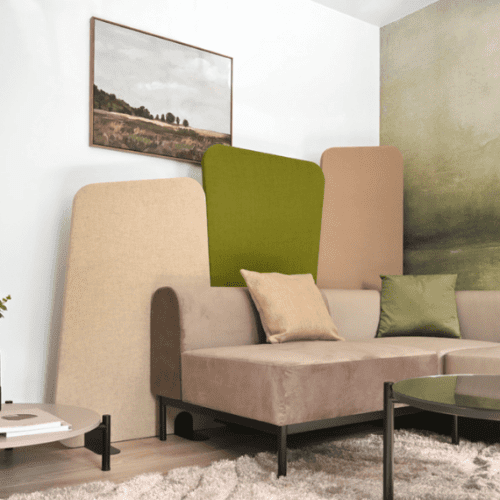 identity furniture ryve floor standing screens in beige and green fabric behind comfy modern sofa, perfect for breakout and collaborative office areas