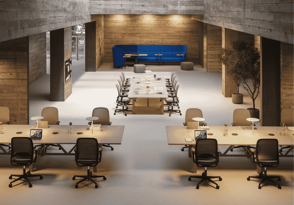 Modern open-plan office with premium mesh and executive office chairs arranged around ergonomic desk