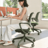 edit office ux mesh chair in green side with a person sitting and working on a desk in an office environment