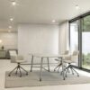 Serenity medium sized meeting table in white surrounded by 3 office chairs in a meeting room