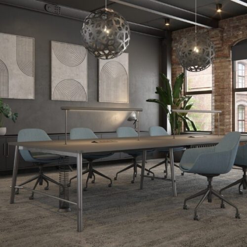 Serenity large meeting table surrounded by 4 office chairs in a meeting room