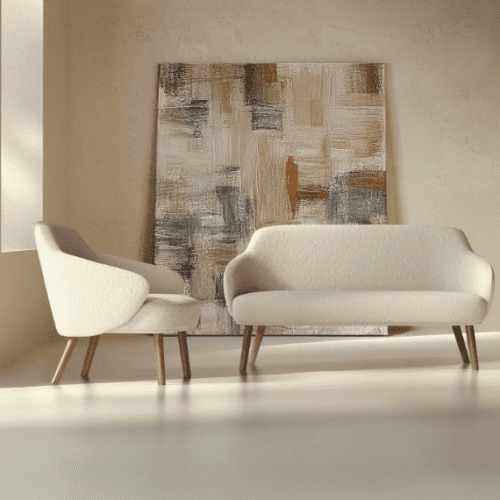 Palma soft seating wooden four legged one seater sofa next to a wooden legged two seater sofa with art work behind