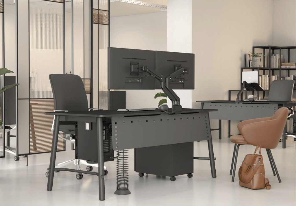 Minimalist executive desk with wireless charging, monitor arms, and clean cable management in a contemporary office
