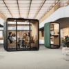 four person framery office pod smart with telephone booth behind
