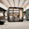 smart office pod from framery 4 person pod with soft seating lite range with integrated lighting in an office fit out