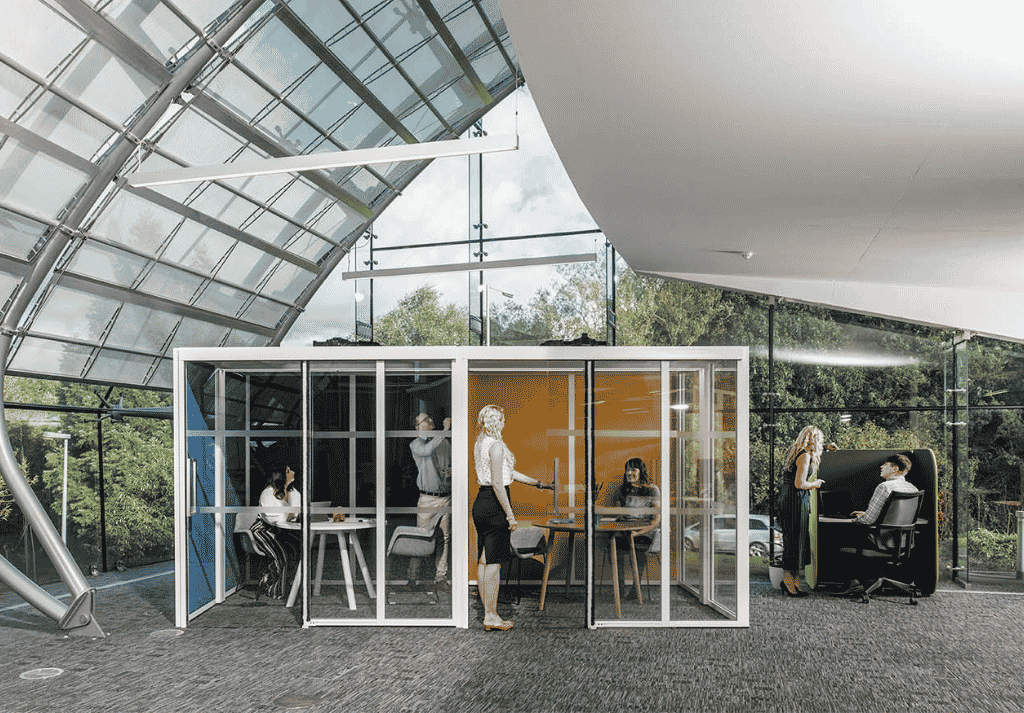 Hoozone Office Pod modular glazed design with custom wall panels and commercial office interior setting