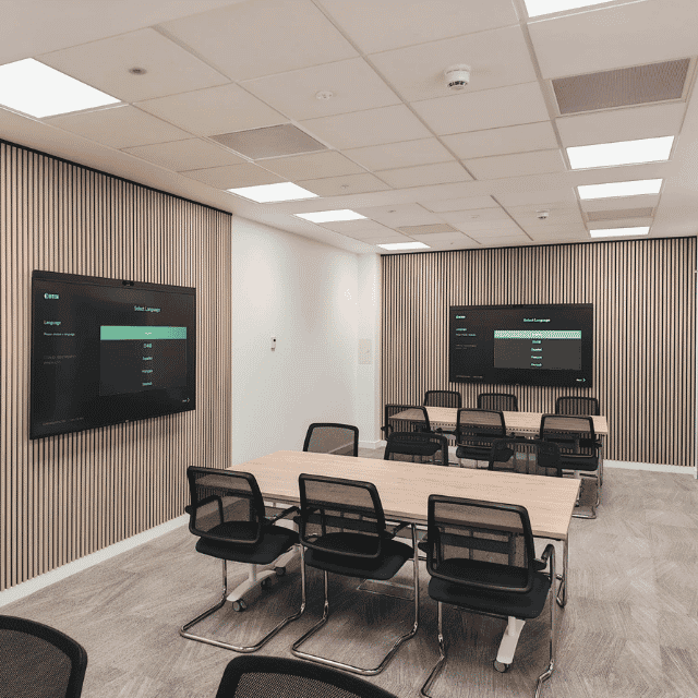 Training room setup with flexible tables, and acupanel features for Lab Fit – Trim Tech