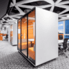 side view of the hush office pod from edit in orange and white