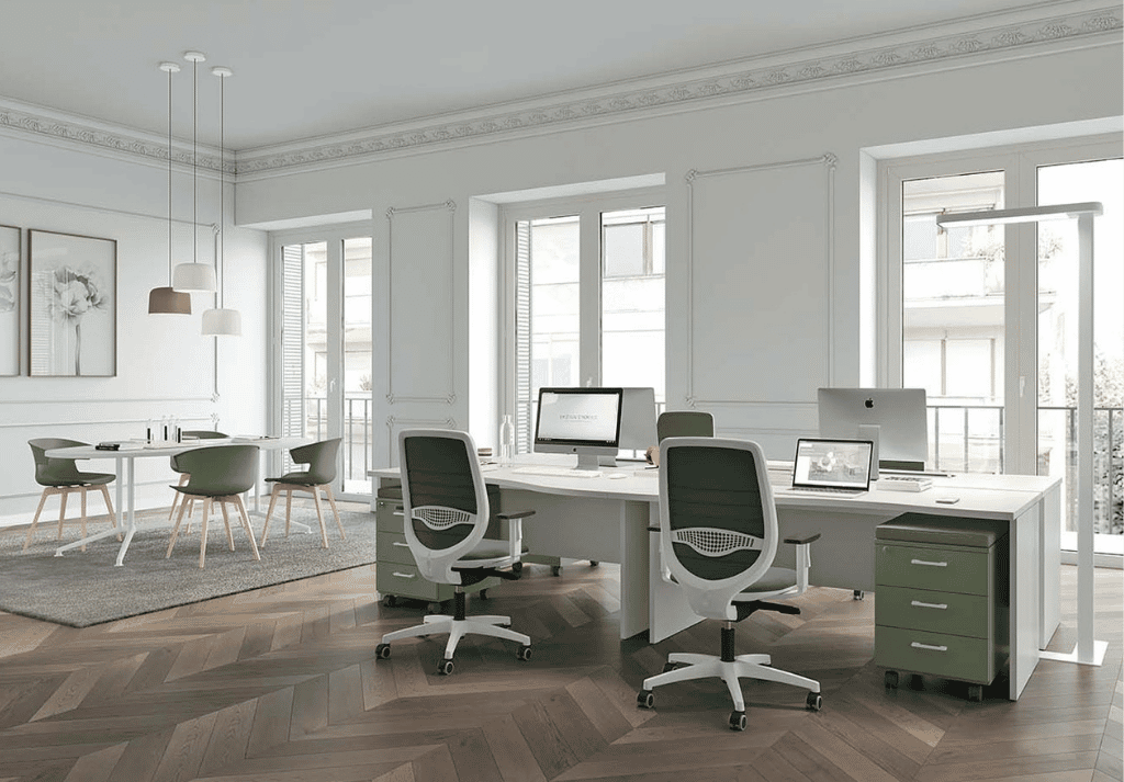 Modern office workspace with ergonomic office desks and collaborative team layout