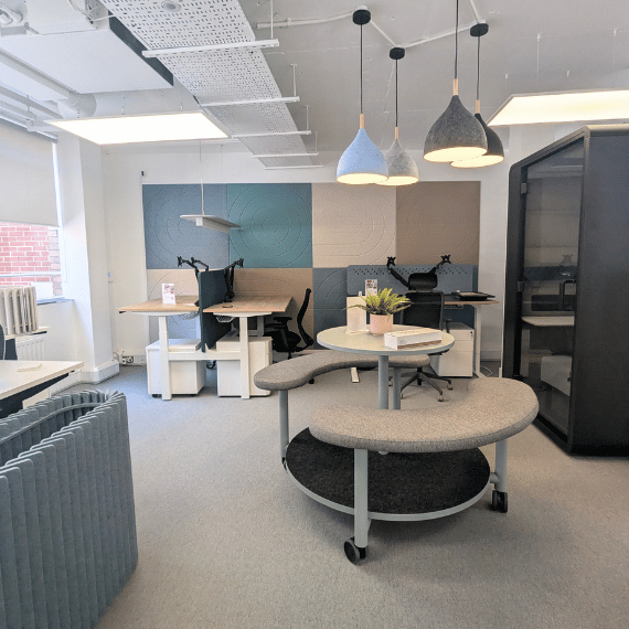 acoustic wall panels, height adjustable desks with enclosed acoustic pod from edit office in the london the vault showroom