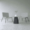 node coffee table from imperial with black base and slate top with reception chairs