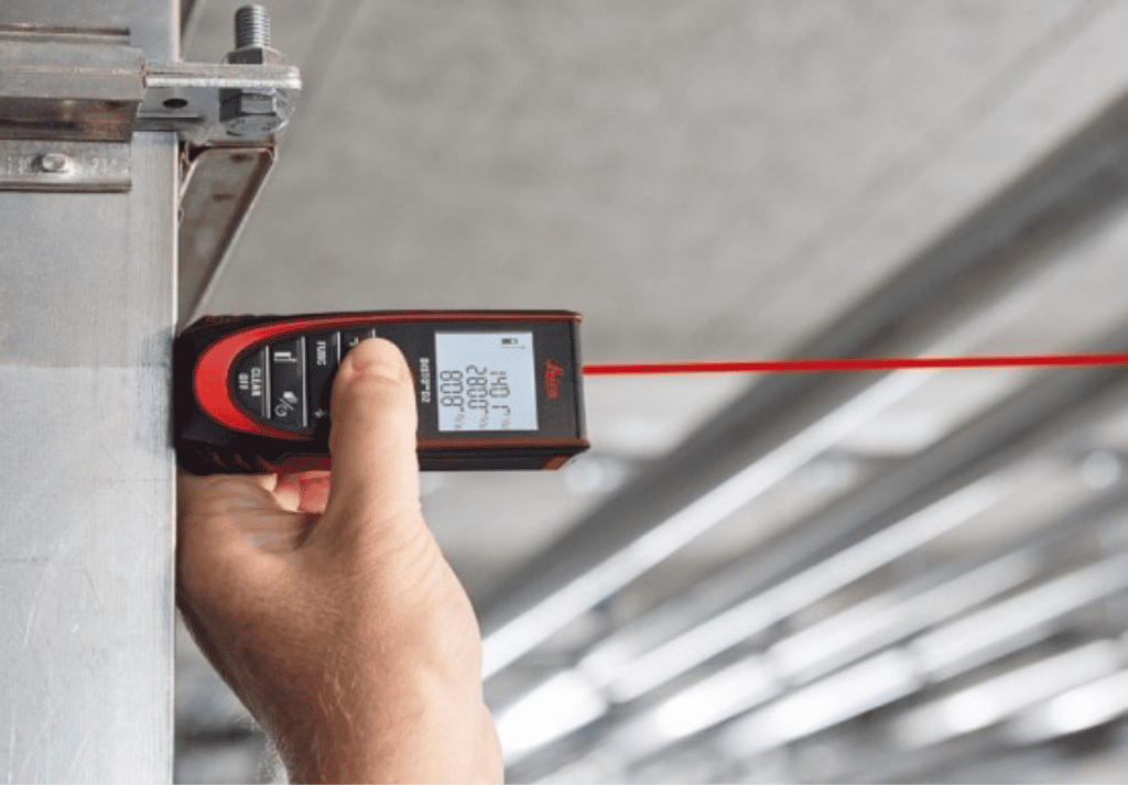  Measuring office floor space to calculate usable workspace and desk placement]