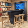 athena av table with tv and henry high stools in the jdd london showroom