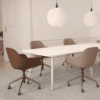 white lux boardroom table with natural and trendy meeting chairs on castors