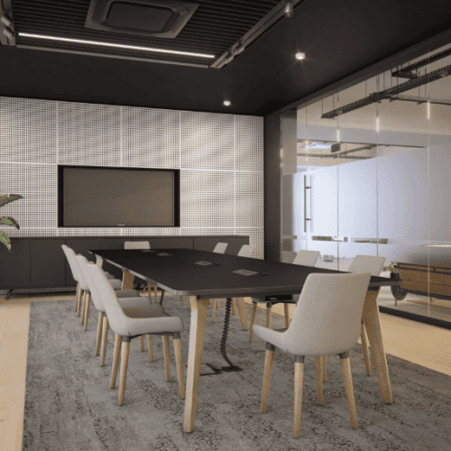 meeting room shot of the lux boardroom table with black top and wooden leg and the hampton meeting chair in grey with feature wall and tv