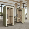 close up of the mura light acoustic workbooth from identity furniture uk manufactured in green exterior with cream interior