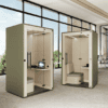 identity furniture mura workbooth acoustic solutions in open plan office in green fabric with cream interior and led lighting