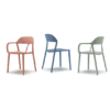 pledge mina chair on white background in brick red, blue and green